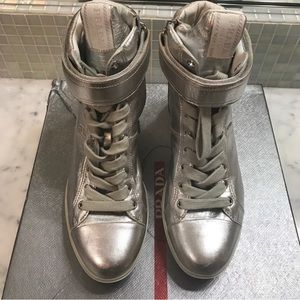 Prada metallic high stop wedge sneakers